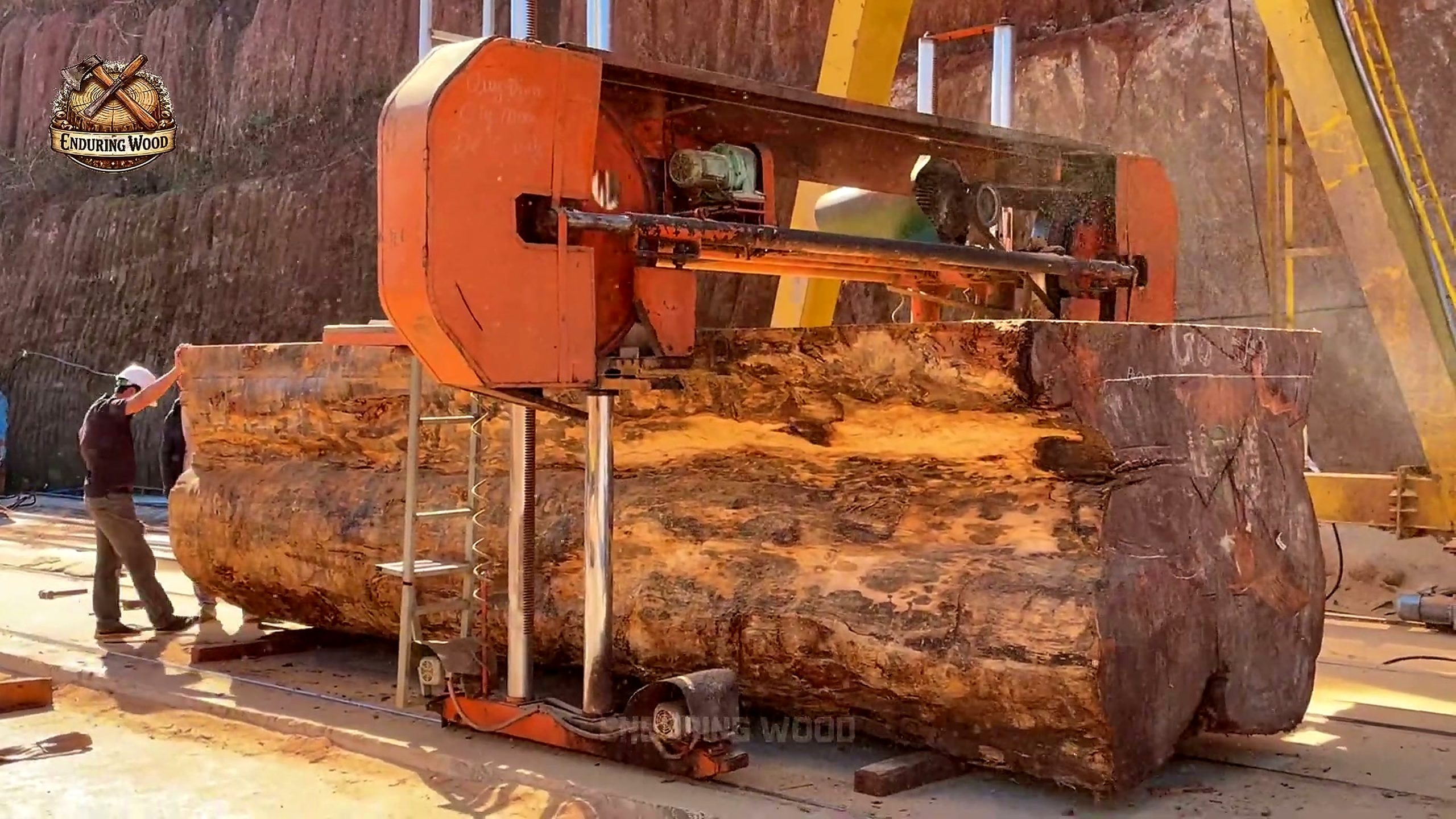 extreme giant wood processing massive logs - the setup or early workflow visible in the source video
