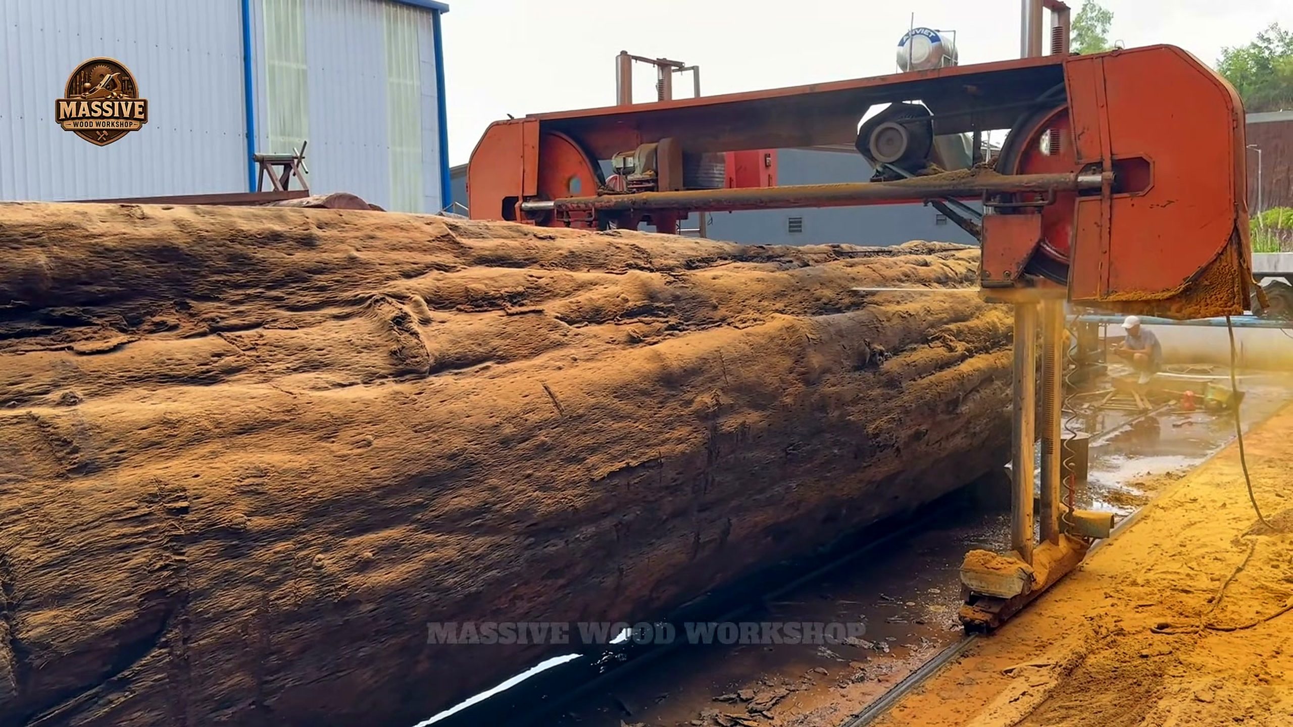 inside sawmill turning 2000 year old - the setup or early workflow visible in the source video